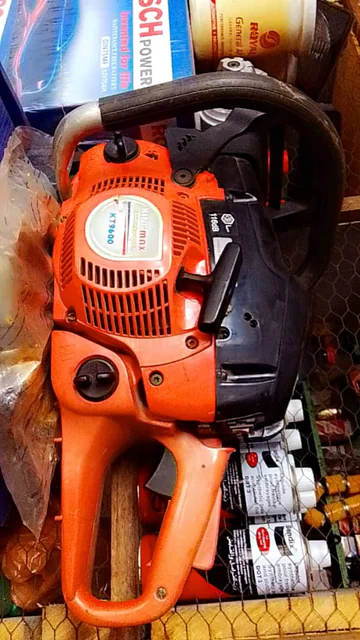 Tronçonneuse thermique orange