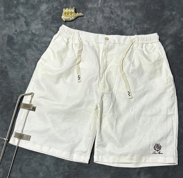 Pantalon de sport noir avec bandes blanches
