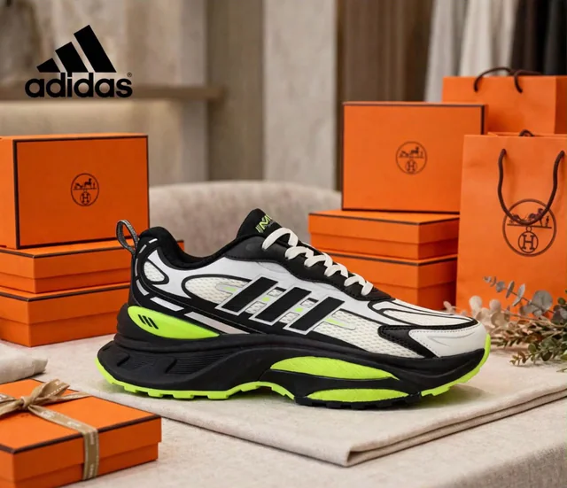 Baskets Adidas noires, blanches et vertes